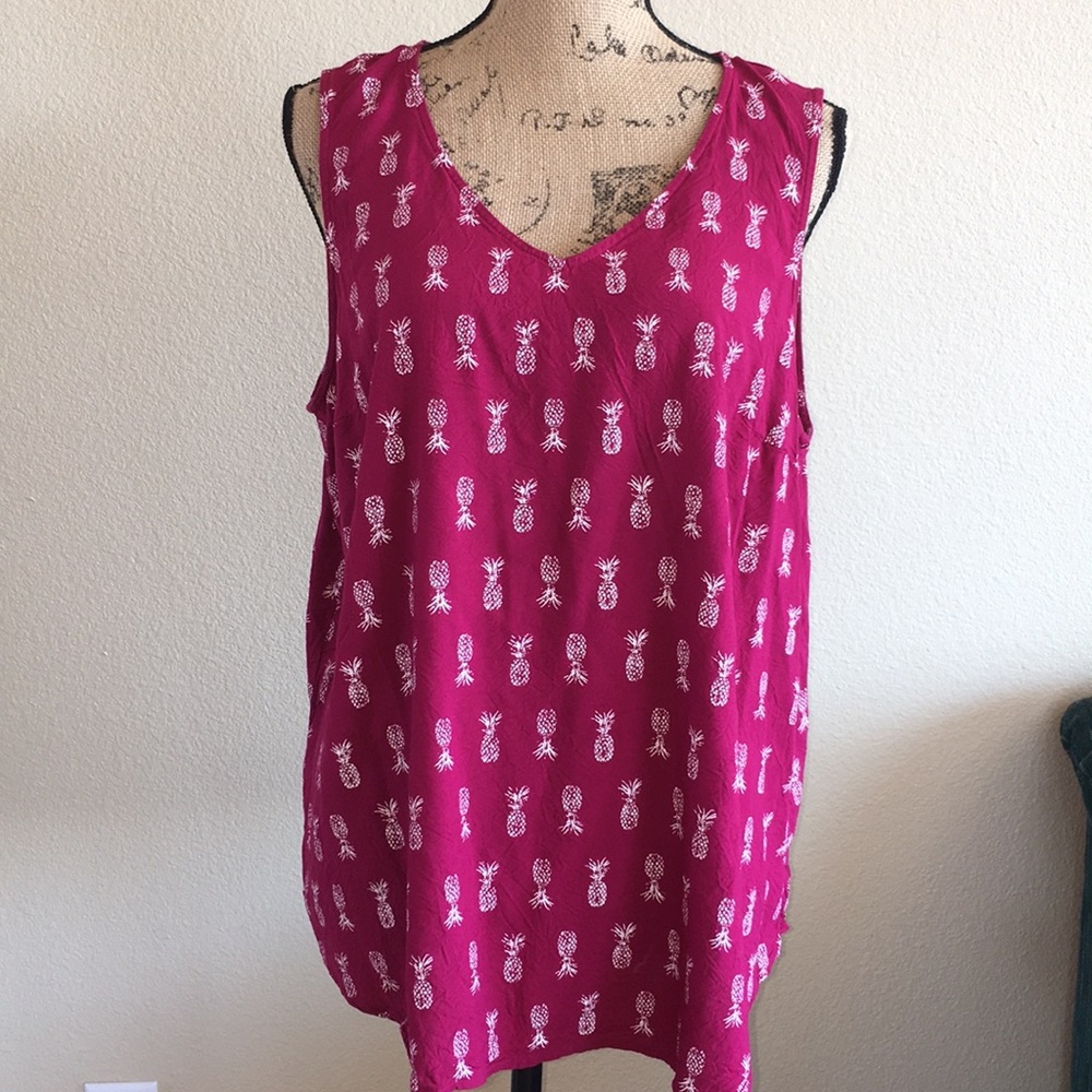 Dark pink slight v-neck tank top.